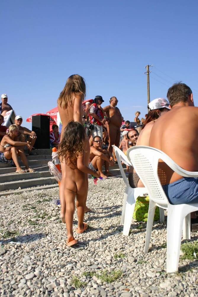 Naturist Standing Sideline - nudism in the world