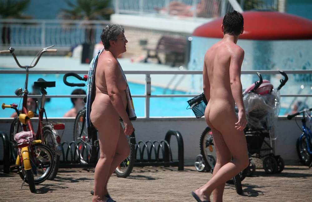 Sun-Soaked Sidewalk pics - nudism in the world