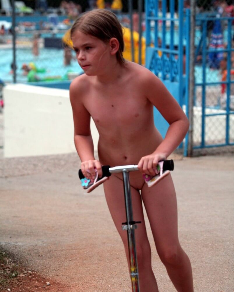 Pool-Side Naturist Scooter pics - nudism in the world