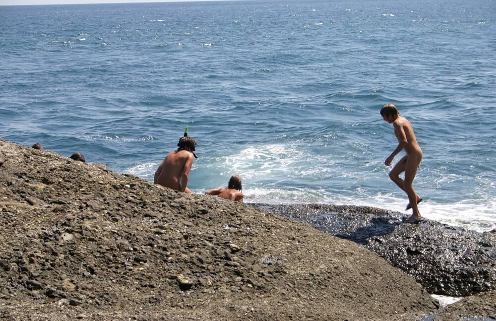Leaning Against Hit Rocks pics - nudism in the world